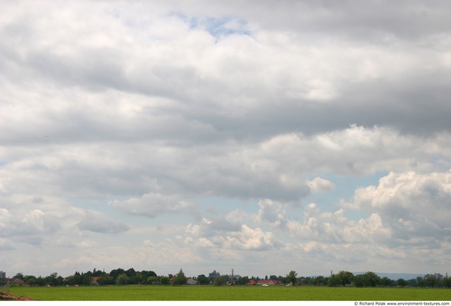 Blue Clouded Skies