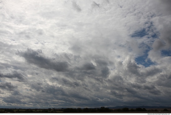 Blue Clouded Skies