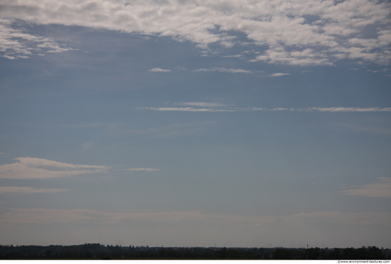 Blue Clouded Skies