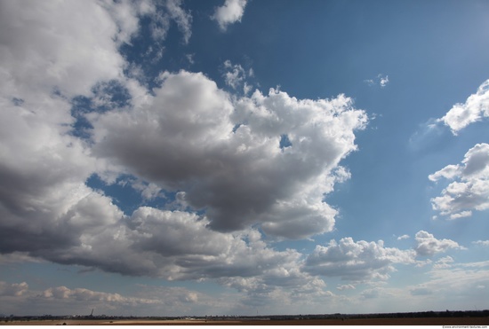 Blue Clouded Skies